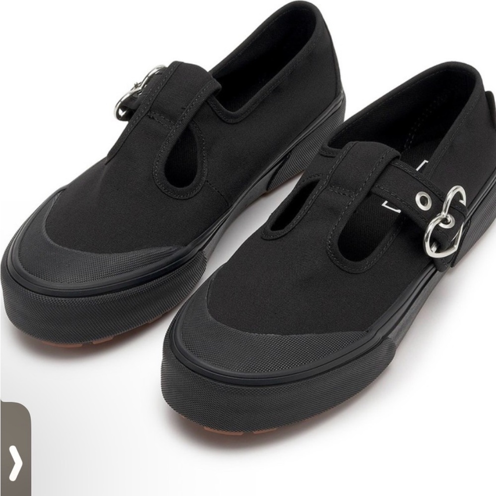 Vans Black Slip-On Sneakers